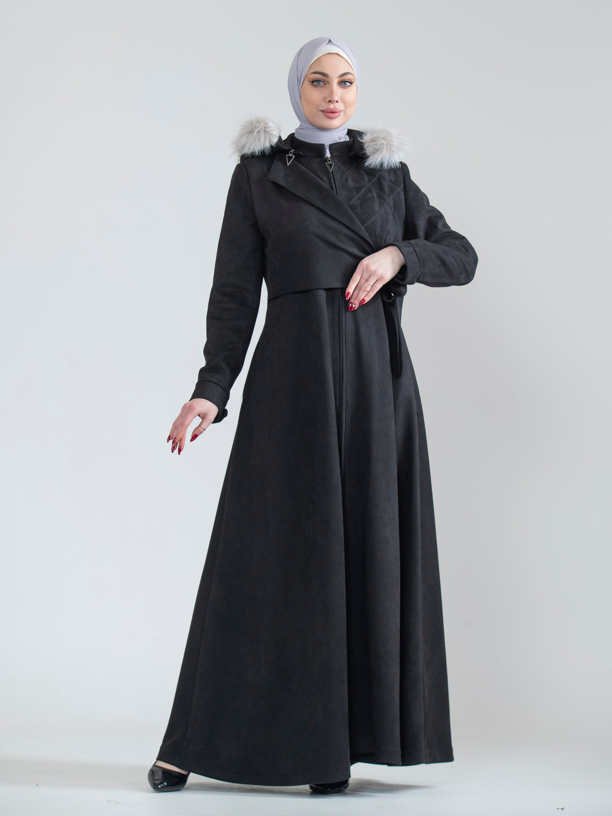 Embroidered women's jilbab and fur hat