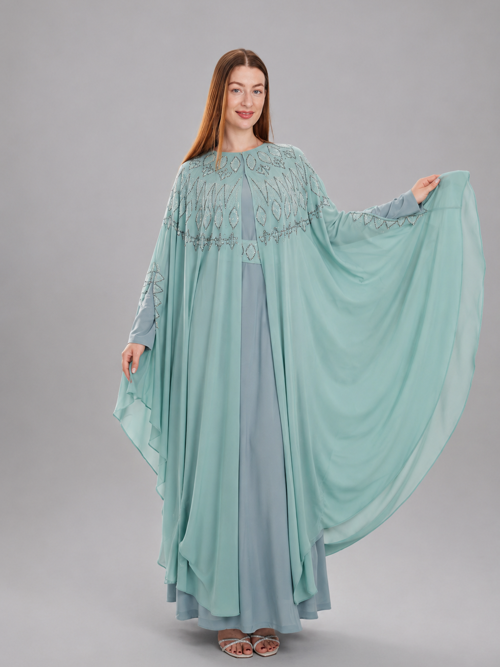 "Falla" bisht embellished with rhinestones.