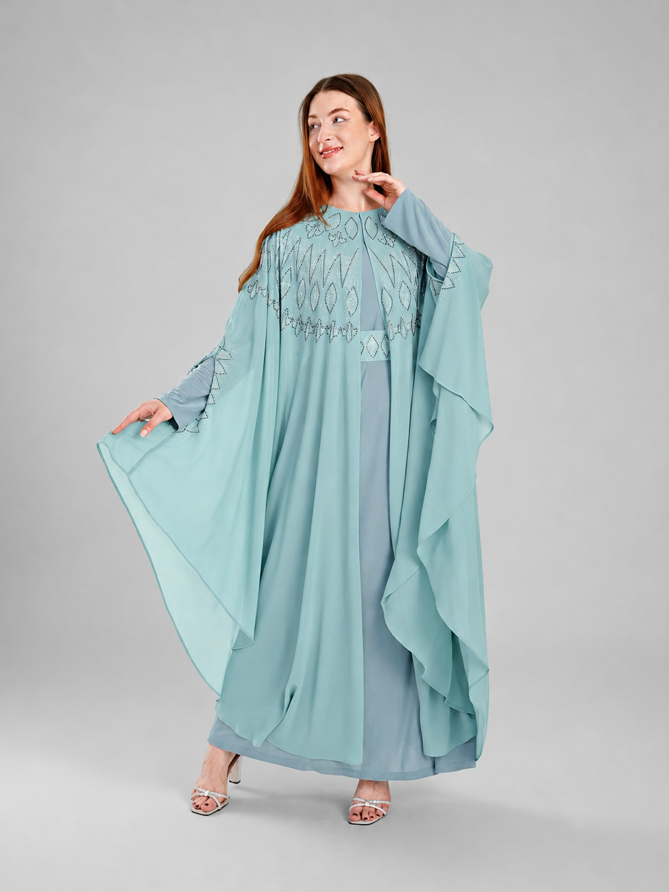 "Falla" bisht embellished with rhinestones.