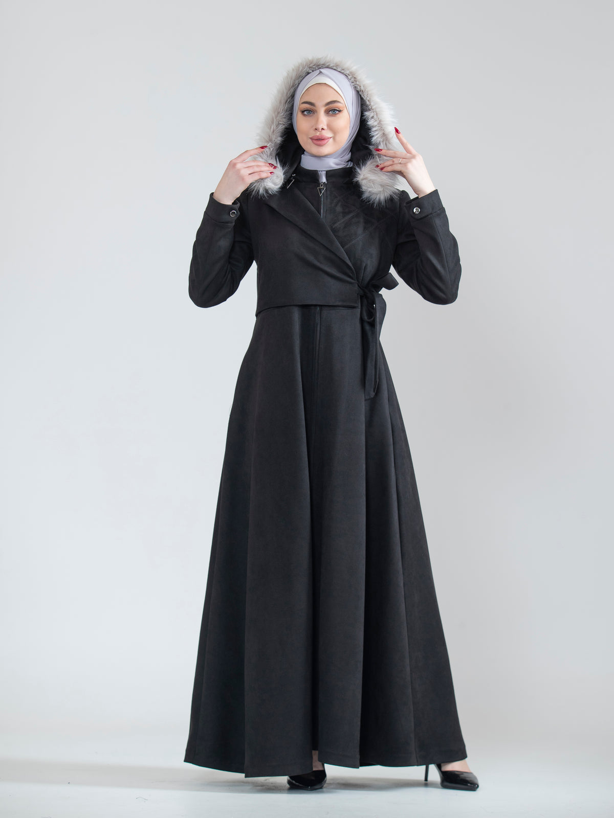 Embroidered women's jilbab and fur hat