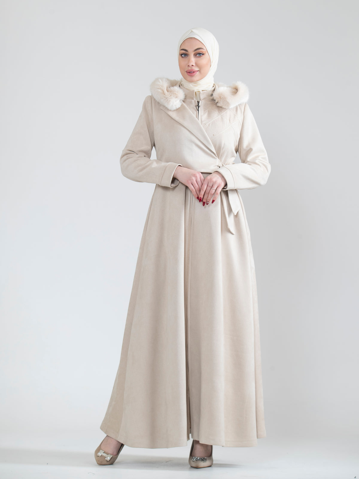 Embroidered women's jilbab and fur hat
