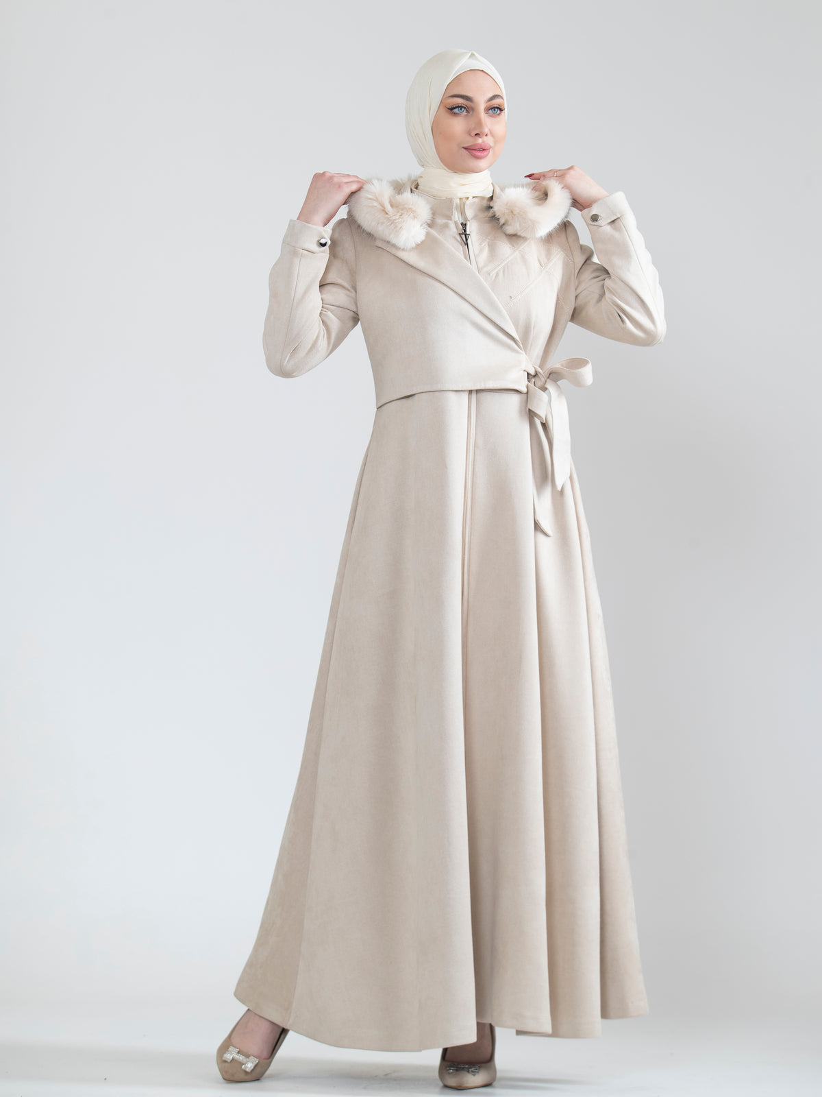 Embroidered women's jilbab and fur hat