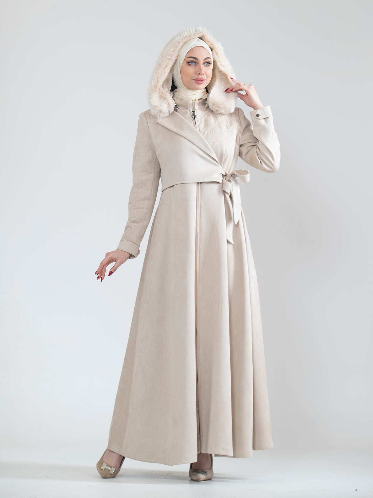 Embroidered women's jilbab and fur hat