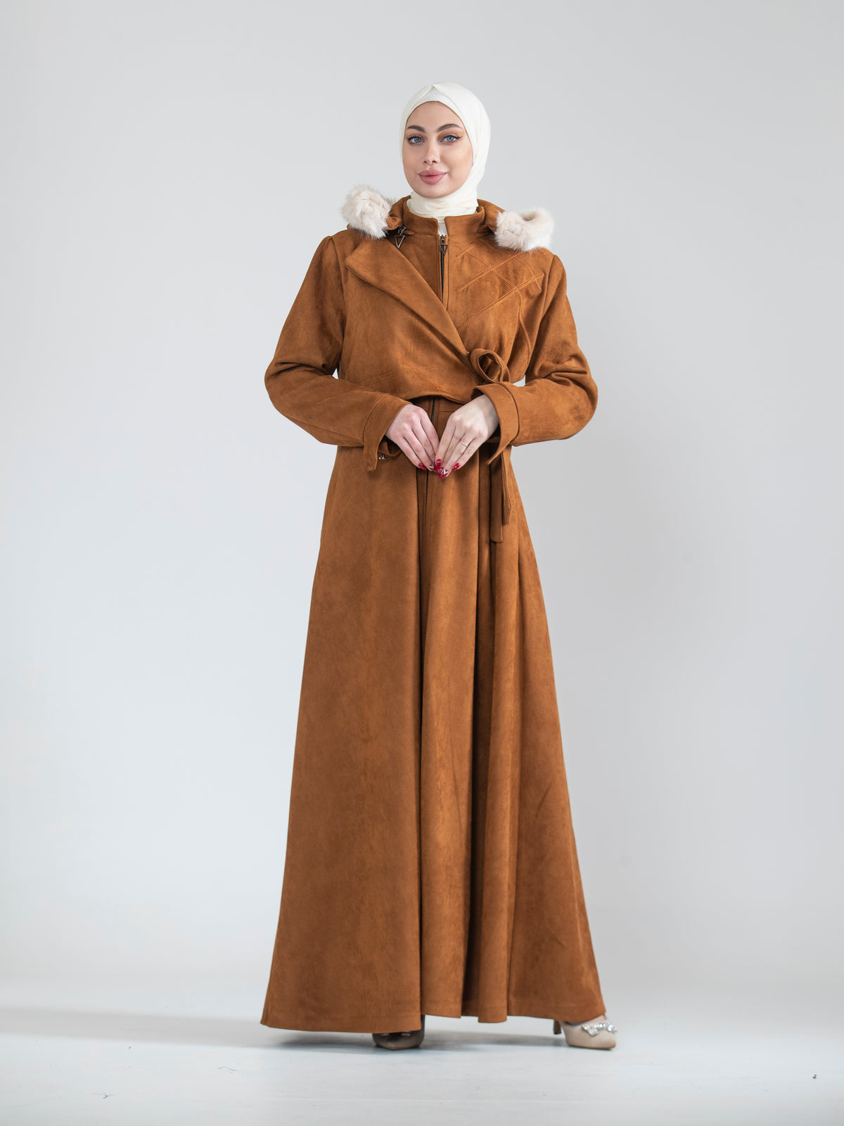 Embroidered women's jilbab and fur hat