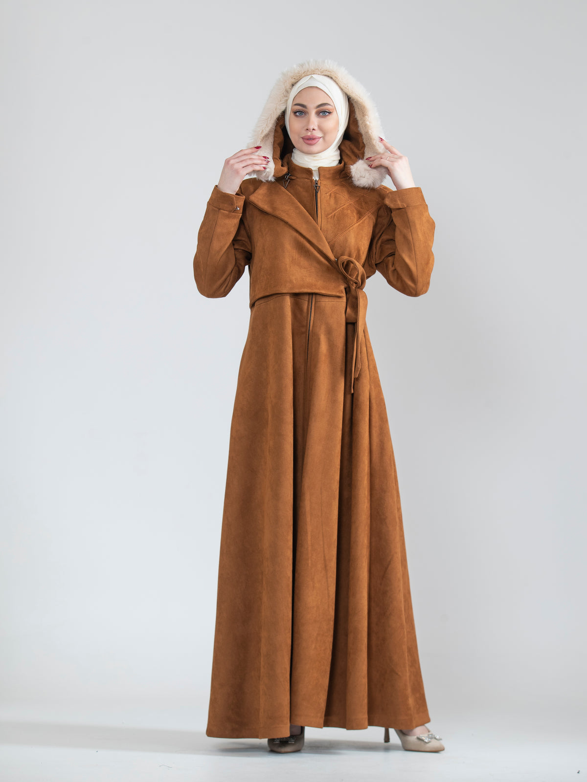 Embroidered women's jilbab and fur hat